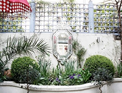 outdoor Venetian Mirror in the garden